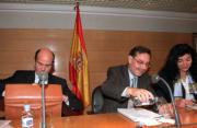 José Folgado, en rueda de prensa con Luis de Guindos y Carmen Becerril. Javier Prieto