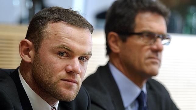 La UEFA rebaja la sanción a Rooney