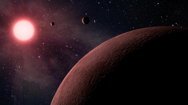Representación artÃstica del sistema solar de una estrella enana roja