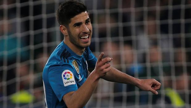 Marco Asensio, celebrando uno de sus goles en el Benito Villamarín frente al Betis