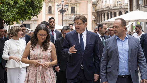 Mónica Oltra, Ximo Puig y Rubén Martínez Dalmau, durante la toma de posesión del presidente de la Generalitat