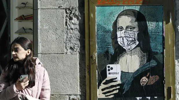 La Mona Lisa Con Mascarilla Por El Mobile World Virus