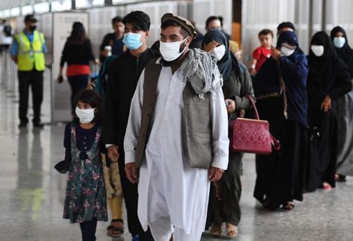 Afghan refugees arrive at Dulles International Airport (Virginia), near Washington DC, after their evacuation from Kabul