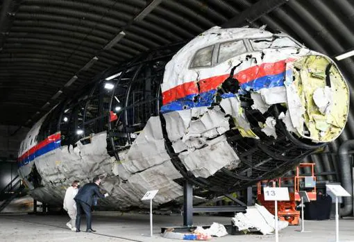 Wreckage of Malaysian Airlines plane downed by missile while flying over Ukraine