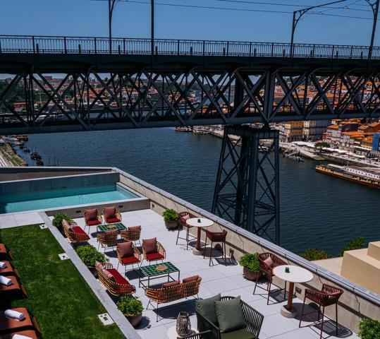 Swimming pool and one of the terraces of the new Vincci Ponte de Ferro hotel, in Porto.